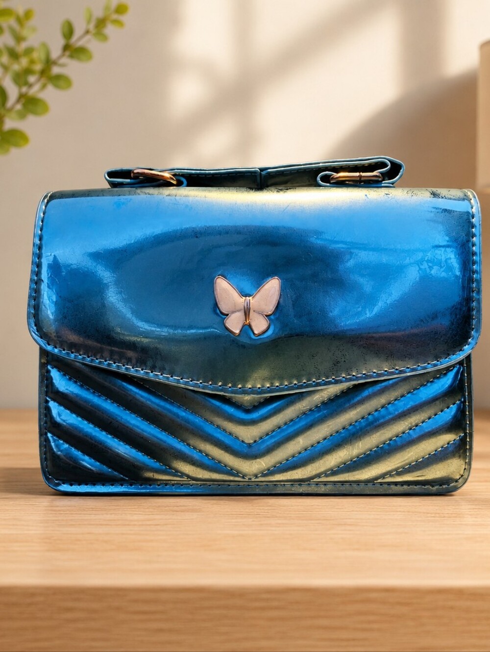 Shiny Blue Mini Bag with Butterfly Detail